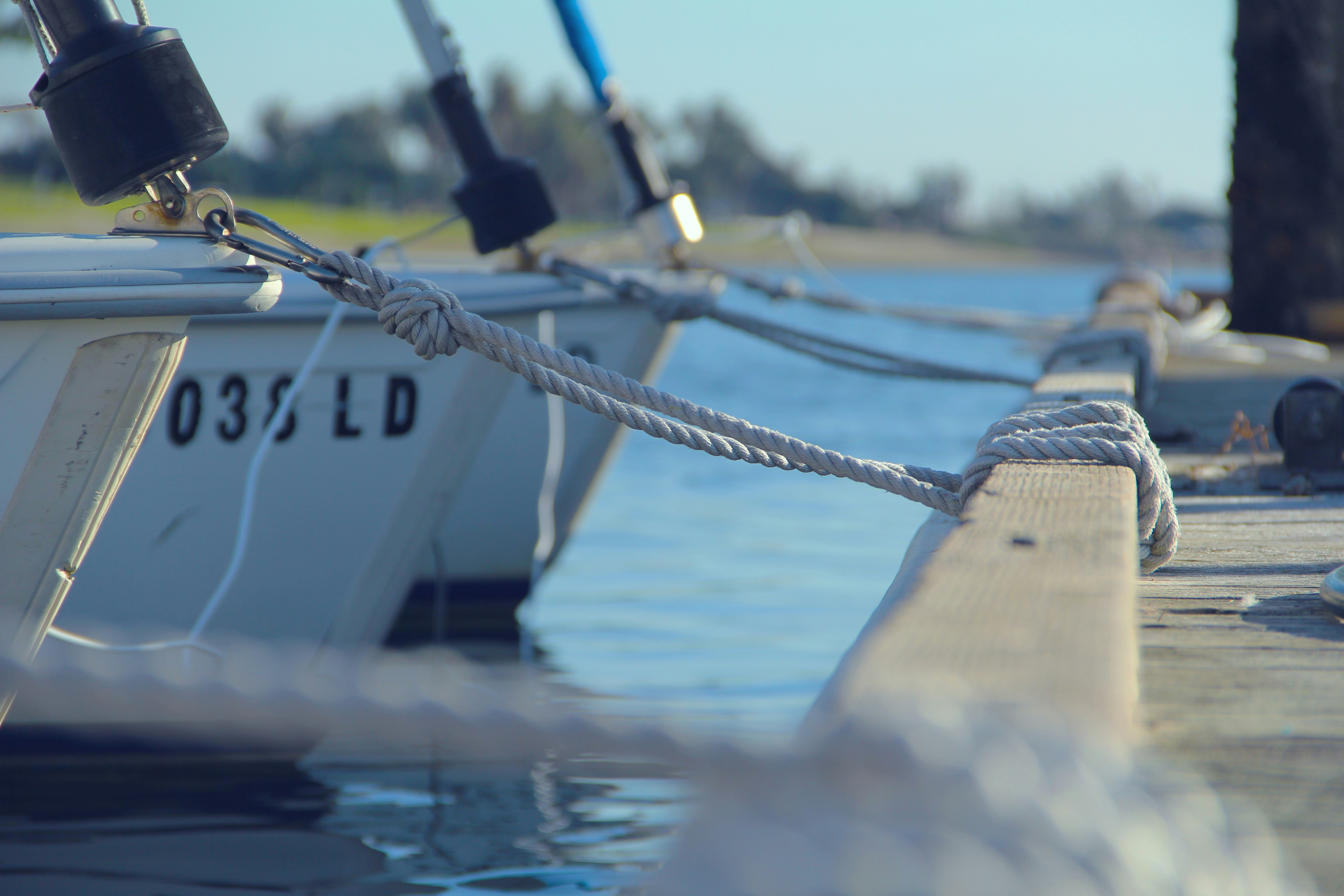 shallow focus photography of boats on body of water